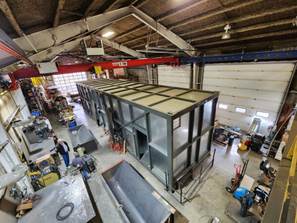 Saulteau First Nation Cultural centre plant being assembled